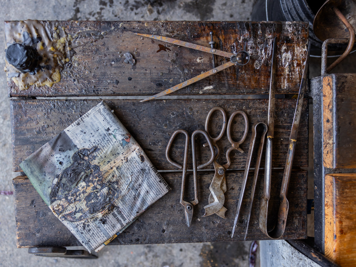 glassblowing tools at the bench